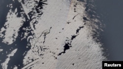 Qatari LNG tanker Al Rekayyat stranded off the coast of Oman after a strike. European Union/Copernicus Sentinel-2/Handout via REUTERS 