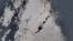 Qatari LNG tanker Al Rekayyat stranded off the coast of Oman after a strike. European Union/Copernicus Sentinel-2/Handout via REUTERS 