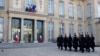 French Republican Guards walk in the courtyard before the arrival of European leaders for a meeting on Ukraine and European security at the Elysee Palace in Paris, Feb. 17, 2025.