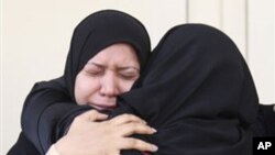 Pakistani teenager Malala Yousafzai, right, who was shot and injured by the Taliban for advocating girls' education, is awarded the International Children's Peace Prize 2013 by 2011 Nobel Peace Prize winner Tawakkol Karman of Yemen, left, during a ceremony in the Hall of Knights in The Hague, Netherlands.