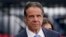 FILE - Former New York Governor Andrew Cuomo prepares to board a helicopter after announcing his resignation in New York, Aug. 10, 2021. On Saturday, he announced he is running for mayor of New York.