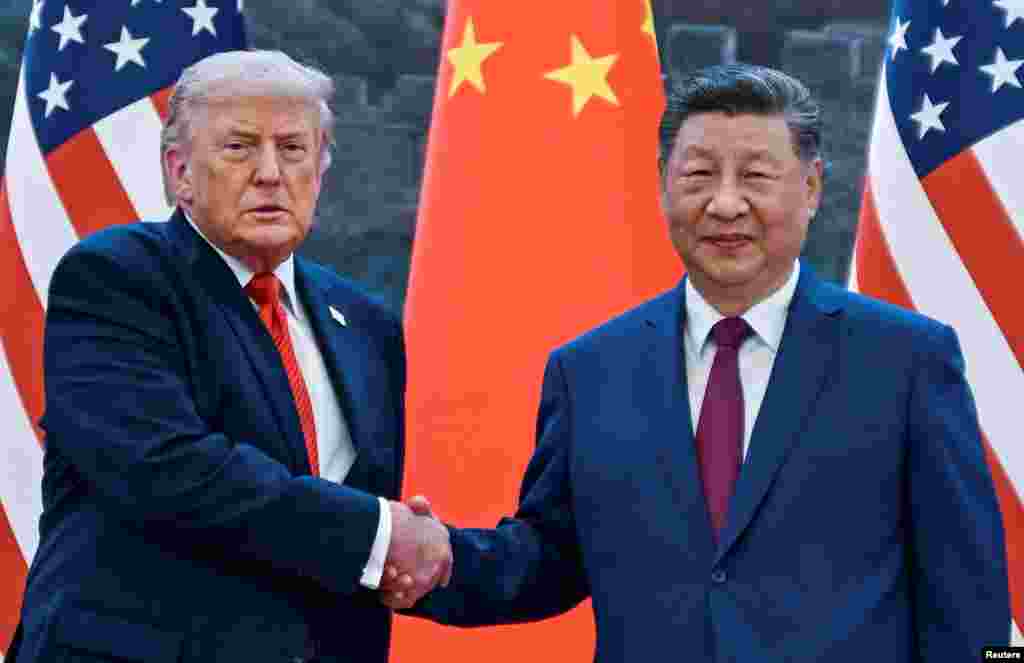 美国总统特朗普与中国国家主席习近平在北京人民大会堂握手。(2026年5月14日)