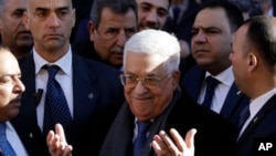 Palestinian President Mahmoud Abbas, center, attends the inauguration ceremony of the Palestinian embassy to the Holy See at the Vatican, Jan. 14, 2017.