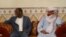 FILE - Iyad Ag Ghaly, right, the alleged leader of the extremist Ansar Dine Islamist group, meets Burkina Faso's then-foreign minister, Djibril Bassole, in Kidal, Mali, in 2012. The International Criminal Court on June 21, 2024, made public an arrest warrant for Ghaly.