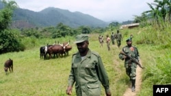 Le général Janvier Buingo Karairi, le chef des Maï Maï, terme collectif désignant plusieurs groupes paramilitaires disparates prétendant défendre des communautés ethniques particulières, groupe "l'Alliance des Patriotes pour un Congo libre et souverain.