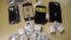 FILE - Counterfeit iPhone accessories are seen in this handout photograph taken Oct. 23, 2011. A Chinese national in the U.S. on a student visa was sentenced Tuesday for smuggling counterfeit Apple products from China into the U.S.