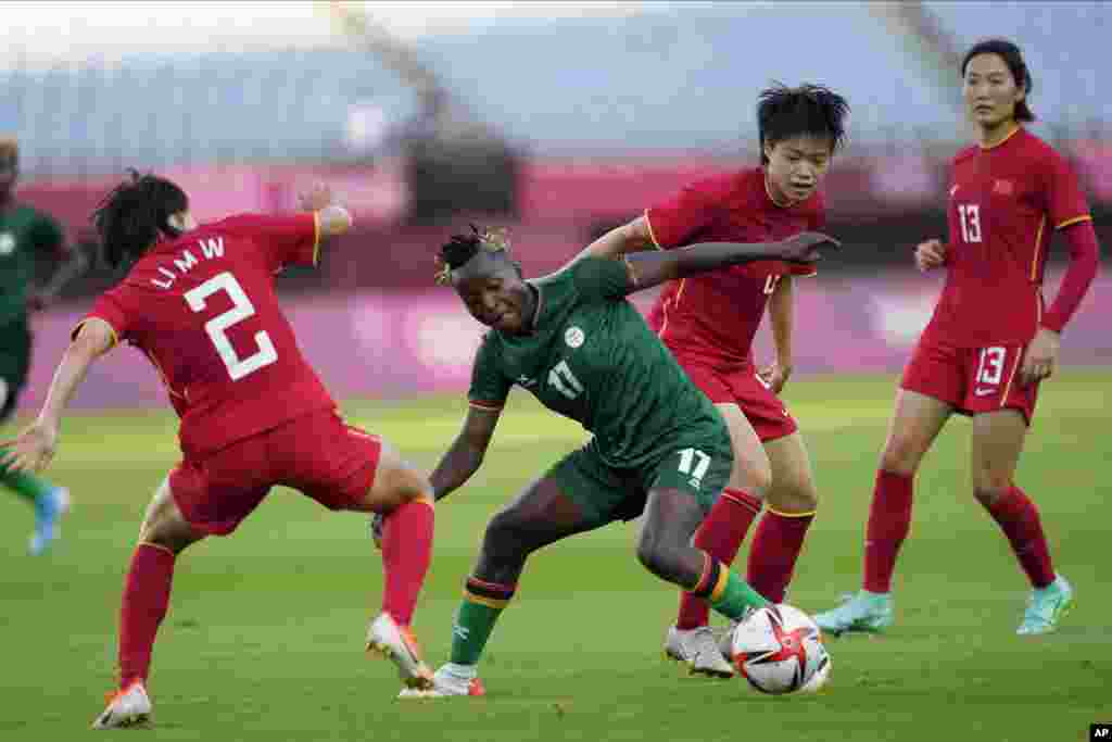 Zambia&#39;s Racheal Kundananji controls the ball during a women&#39;s soccer match against China at the 2020 Summer Olympics, Saturday, July 24, 2021, in Miyagi, Japan. (AP Photo/Andre Penner)