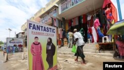 FILE - A shopping area is seen in Somalia's capital Mogadishu, Oct. 27, 2015. Businesses expect an uptick in activity following the resumption of diplomatic relations between Somalia and Kenya.