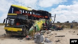 A bus lies wrecked after colliding with another one on a highway near Uyuni, Bolivia, on March 1, 2025. (Bolivian Police via AFP)