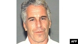FILE - This undated handout photo obtained July 8, 2019, courtesy of the Palm Beach County Sheriff's Departmant shows Jeffrey Epstein.