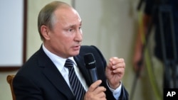 Tổng thống Nga Vladimir Putin phát biểu trong một cuộc họp báo sau khi kết thúc Hội nghị Thượng đỉnh G-20 ở Hàng Châu, Trung Quốc, ngày 5 tháng 9 năm 2016.