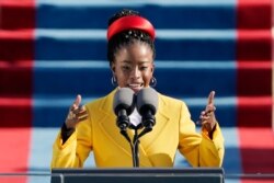 American poet Amanda Gorman reads a poem during the 59th Presidential Inauguration at the U.S. Capitol in Washington, Jan. 20, 2021.