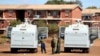 FILE - Police patrol during a 21-day nationwide lockdown called to help curb the spread of coronavirus disease, in Harare, Zimbabwe, April 3, 2020. 