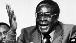 FILE: Robert Mugabe co-leader of the Patriotic Front guerrilla forces, is seen at a press conference in London, Dec. 19, 1979, when it was announced that he and Joshua Nkomo had reached an agreement at Lancaster House on a new constitution and a ceasefire.