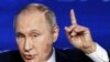 Putin Says US 'Political Dramas' Diverting Focus From Russia