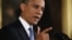 U.S. President Barack Obama gestures while addressing his first news conference since his re-election, at the White House in Washington, November 14, 2012. 