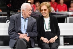 FILE - Former President Jimmy Carter and Rosalynn Carter are seen ahead of an NFL football game between the Atlanta Falcons and the Cincinnati Bengals, Sept. 30, 2018, in Atlanta.