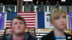 FILE - Voters look on as Democratic presidential candidate Sen. Bernie Sanders speaks during a campaign a campaign event, Jan. 29, 2016, in Mt. Pleasant, Iowa. A new poll has found 70 percent of voters are frustrated with the current election campaign, while 55 percent feel helpless and similar percentage are angry.