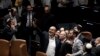 خوشحالی قانونگذاران عضو ائتلاف تحت رهبری نتانیاهو پس از تصویب لایحه پیشنهادی او برای محدود کردن اختیارات دادگاه عالی. کنست اسرائیل، ۲۴ ژوئیه ۲۰۲۳