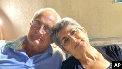 David i Adina Moše (Anat Moshe Shoshany/Elinor Shahar Personal Management via AP)
