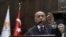 Turkey's President Recep Tayyip Erdogan addresses the members of his ruling party at the parliament, in Ankara, Turkey, Feb. 5, 2020. 