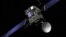 FILE - Artist view of the Rosetta spacecraft. Rosetta’s lander, Philae, is attached and is shown in blue (© ESA/J. Huart)