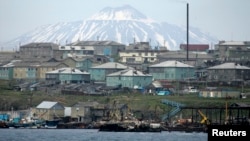 FILE - Kunashiri Island, one of four islands known as the Southern Kurils in Russia and Northern Territories in Japan