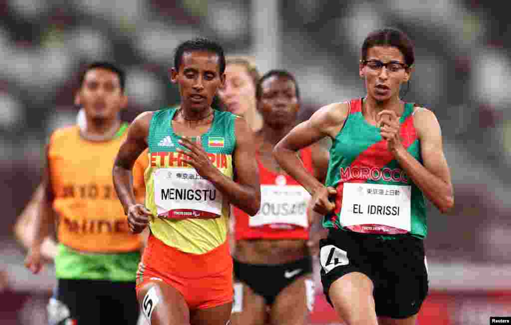 Tigist Gezahagn Menigstu of Ethiopia Fatima and Ezzahra El Idrissi of Morocco in action REUTERS/Lisi Niesner