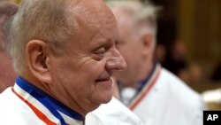 FILE - In this Jan.26, 2018 photo, French chef Joel Robuchon attends the funeral ceremony for late French chef Paul Bocuse at the Saint-Jean cathedral, in Lyon, central France. (Philippe Desmazes/Pool Photo via AP)