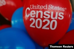 FILE PHOTO: Balloons decorate an event for community activists and local government leaders to mark the one-year-out launch of the 2020 Census efforts in Boston, April 1, 2019.