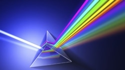 Isaac Newton showed that a prism of glass can separate white light into a spectrum of colors.