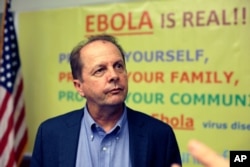 Dr Tom Kenyon, director of the Center for Disease Control's Center for Global Health, listens to a question at a news conference in Monrovia, Liberia, Oct. 1, 2014.