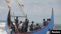 Algunos de los Primeros rescatados Que Se dirigían a Malasia.