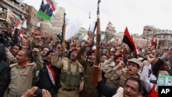 After the start of a Saudi-led airstrike campaign, Shiite rebels known as Houthis protest in Sana'a, March 26, 2015. 