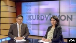 Kurdvizyon hosts Mutlu Civiroglu (L) and Ruken Isik 