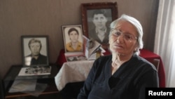 Marina Terishvili, whose son Giorgi was arrested following recent Georgian opposition protests against the government's decision to suspend talks on joining the European Union, poses for a picture in her house in Tbilisi, Georgia December 10, 2024. 