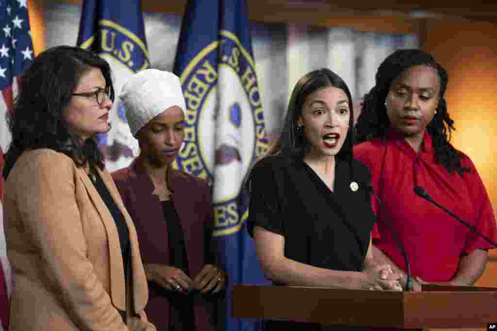 U.S. Rep. Alexandria Ocasio-Cortez, D-N.Y., speaks as, from left, Rep. Rashida Tlaib, D-Mich., Rep. Ilhan Omar, D-Minn., and Rep. Ayanna Pressley, D-Mass., listen during a news conference at the Capitol in Washington, July 15, 2019. President Donald Trump intensified his incendiary comments about the four Democratic congresswomen of color, urging them to get out if they don&#39;t like things going on in America.