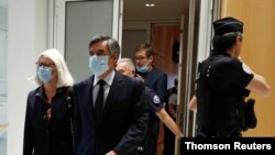 Former French Prime minister Francois Fillon at the Paris' Courthouse June 29, 2020, that has handed him a five-year prison sentence with three years suspended, convicting him on charges of setting up a fake job for his wife, who was also found guilty.