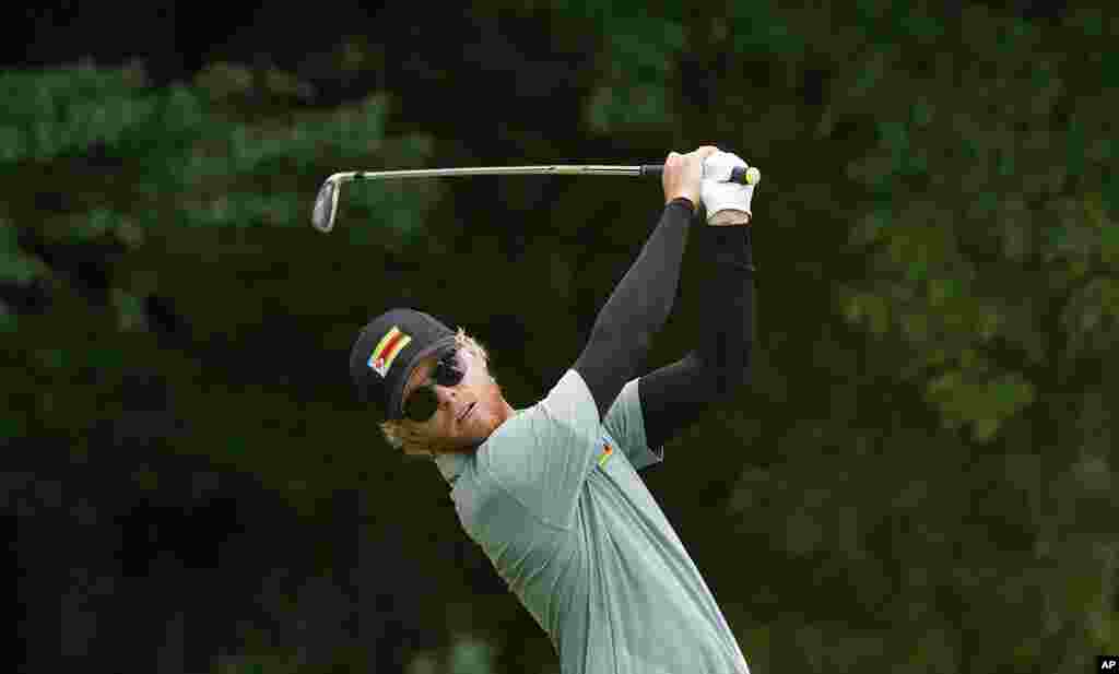 Scott Vincent of Zimbabwe XX watches his tee shot on the fourth hole during the second round of the men&#39;s golf event at the 2020 Summer Olympics on Friday, July 30, 2021, at the Kasumigaseki Country Club in Kawagoe, Japan. (AP Photo/Matt York)