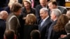 Israeli Prime Minister Benjamin Netanyahu, accompanied by House Majority Leader Kevin McCarthy of California, is greeted as he walks down the aisle before addressing a joint meeting of Congress on Capitol Hill in Washington, March 3, 2015.