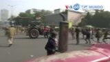 Manchetes mundo 26 Janeiro: Agricultores na Índia saltam barricadas e confrontam-se com a polícia