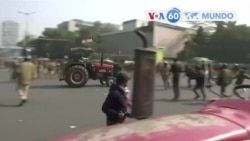 Manchetes mundo 26 Janeiro: Agricultores na Índia saltam barricadas e confrontam-se com a polícia