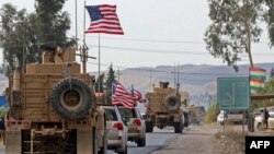 Konvoi kendaraan militer tiba di dekat kota Bardarash, Dohuk, Irak, 21 Oktober 2019. (Foto: dok).