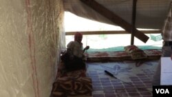 A Syrian refugee in his makeshift home in Lebanon's Beka'a Valley, Sept. 2, 2013. (Heather Murdock for VOA) 