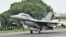 FILE - An U.S.-made F-16V fighter jet lands on the freeway in Changhua county, central Taiwan, May 28, 2019. 
