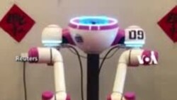 Tahun Baru Imlek: Robot Menulis Kaligrafi China