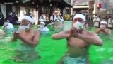 In Japan, Worshippers Take Frosty Plunge Against COVID-19