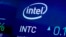 FILE - The symbol for Intel appears on a screen at the Nasdaq MarketSite, in New York on Oct. 1, 2019. 