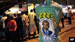 A supporter of President Laurent Gbagbo watches election results in Abidjan (File)