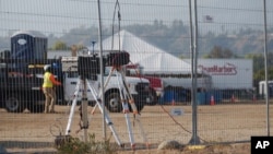 Air quality monitoring equipment is seen at Lario Park, used temporarily by the U.S. Environmental Protection Agency to process hazardous materials from the Eaton Fire, in Irwindale, California, Jan. 31, 2025.